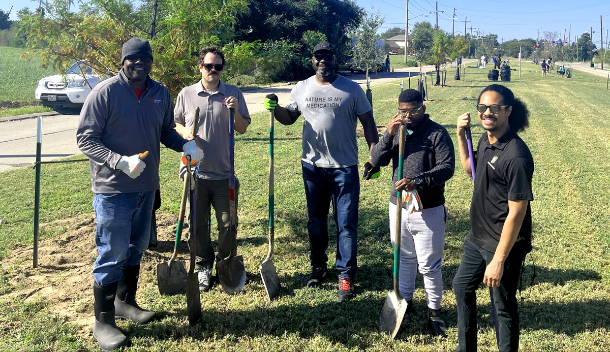 volunteers planting trees in new orleans